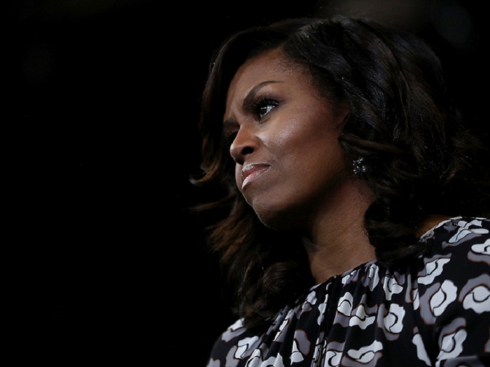 Woman fired for calling Michelle Obama an `ape in heels` to continue to work